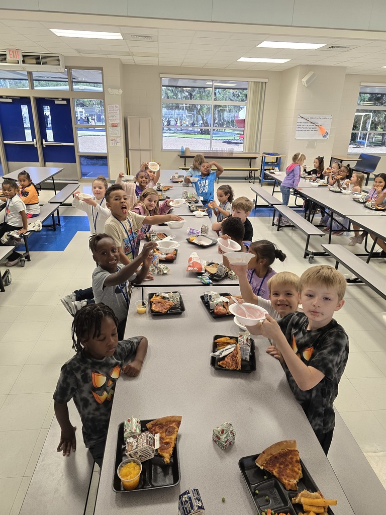 Students enjoying ice cream during the PBIS reward event.