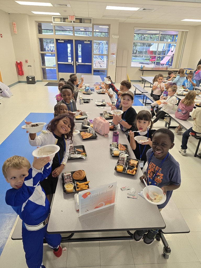 Students enjoying ice cream during the PBIS reward event.