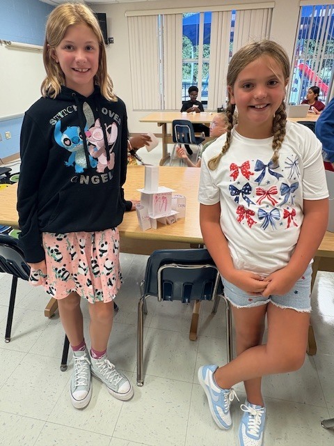 MES Students in STEM lab building Card Towers to deepen understanding of Scientist. 