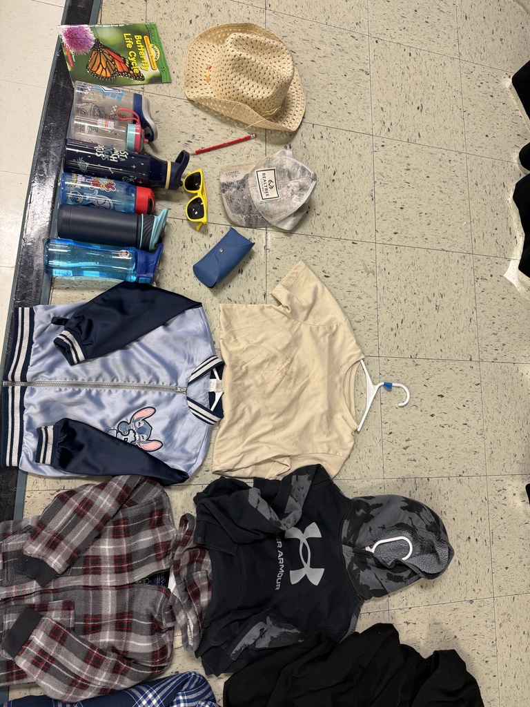 Miscellaneous items: a baseball cap, a straw hat, sunglasses, multiple water bottles, a small book, a pencil, and several jackets and shirts.