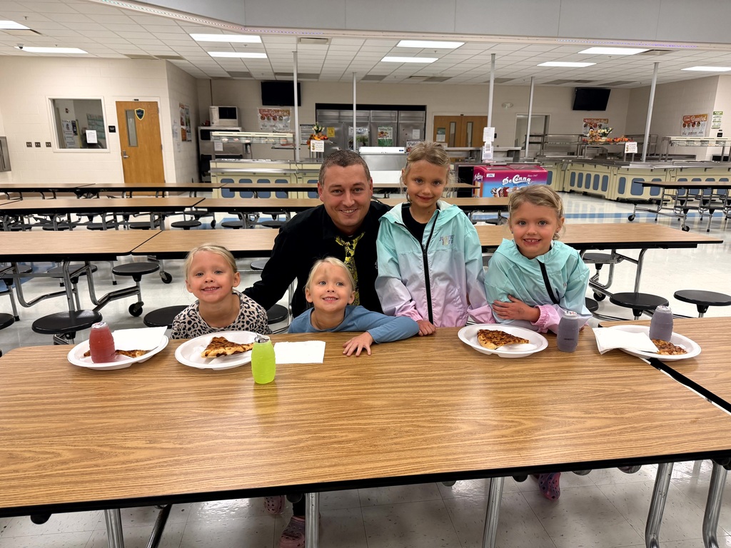 MES Families and students at our Fall Family night Book and Pizza pop-up.