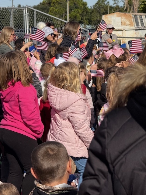 Students holding flags