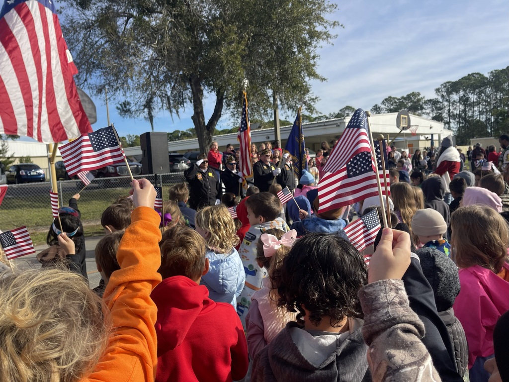 Students holding flags