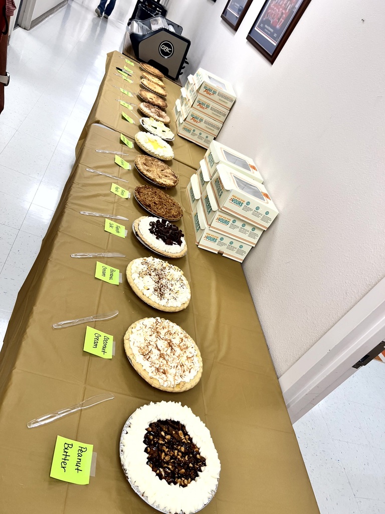 MES Staff enjoying Pie Day.