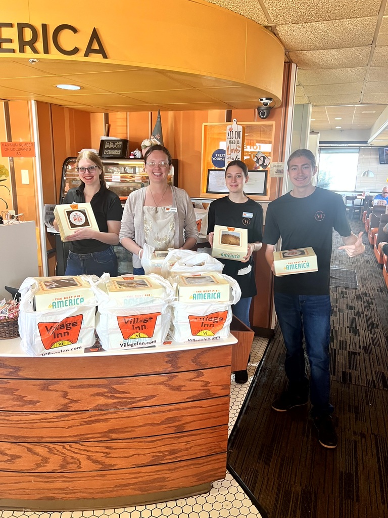 MES Staff enjoying Pie Day.