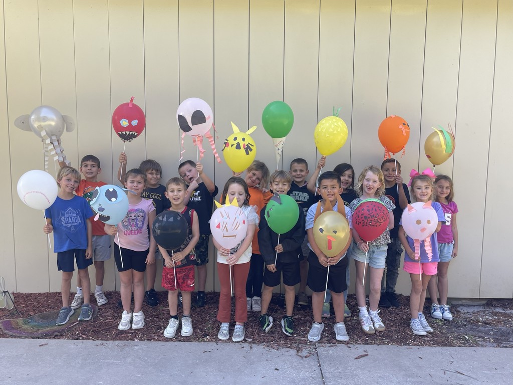Class celebrating Thanksgiving Parade.