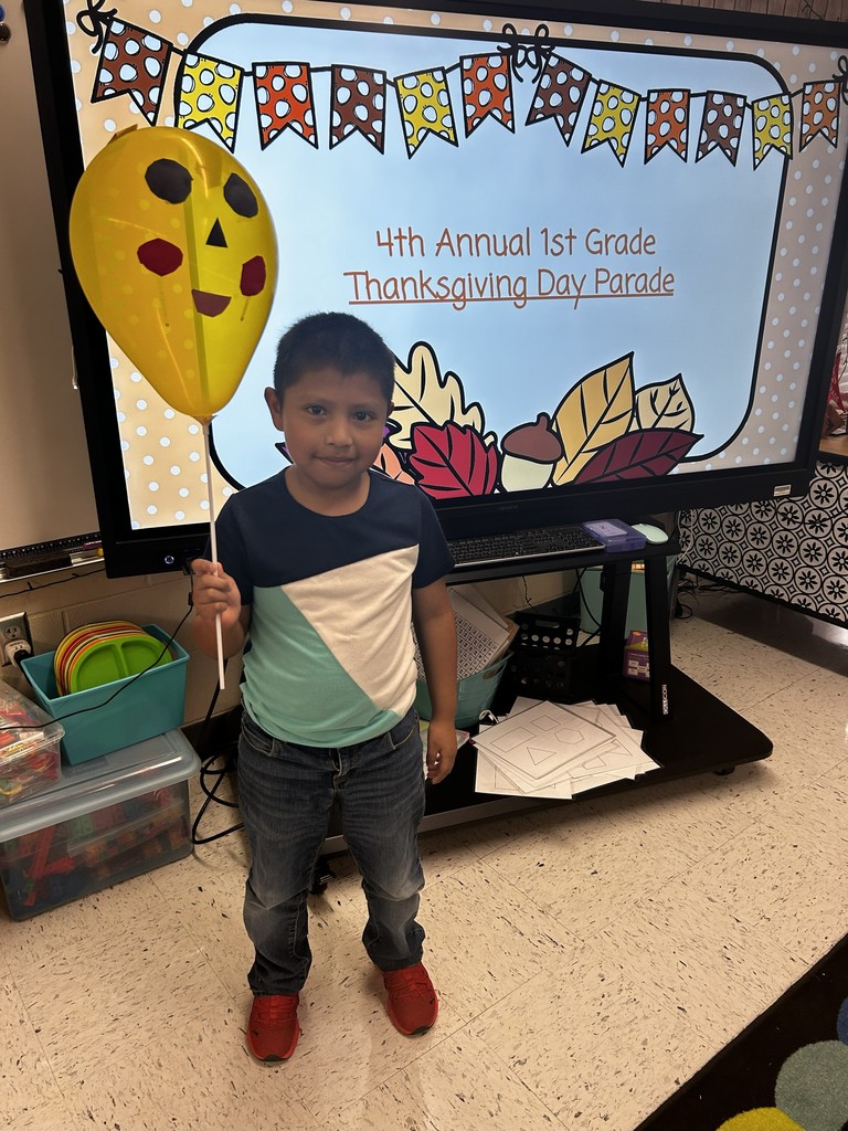 Student celebrating Thanksgiving Parade.