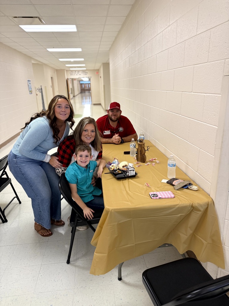 MES Parents enjoying Christmas lunch with their student.