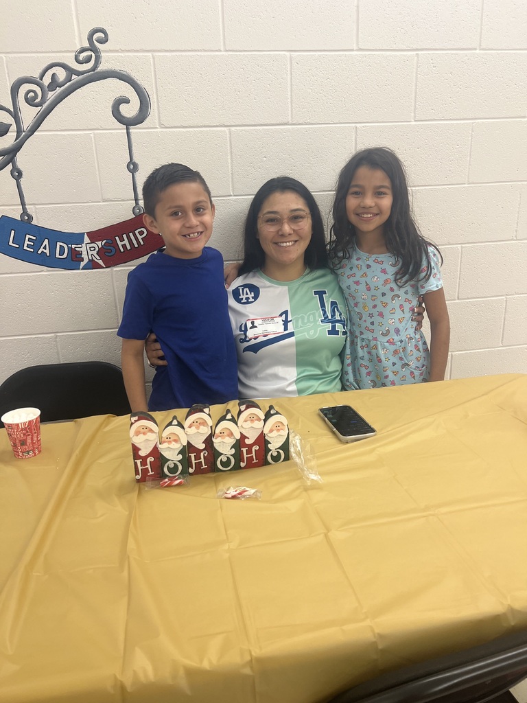 MES Parents enjoying Christmas lunch with their student.