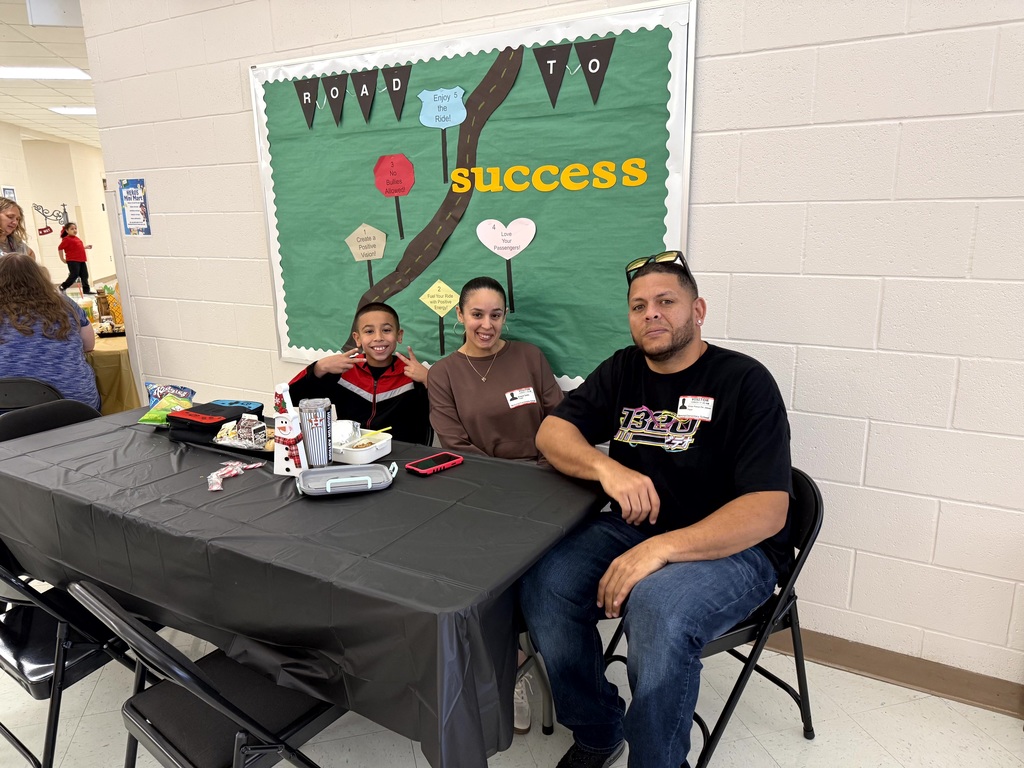 MES Parents enjoying Christmas lunch with their student.