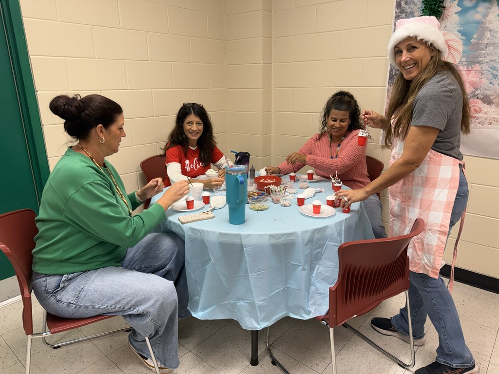 Staff members working on crafts.