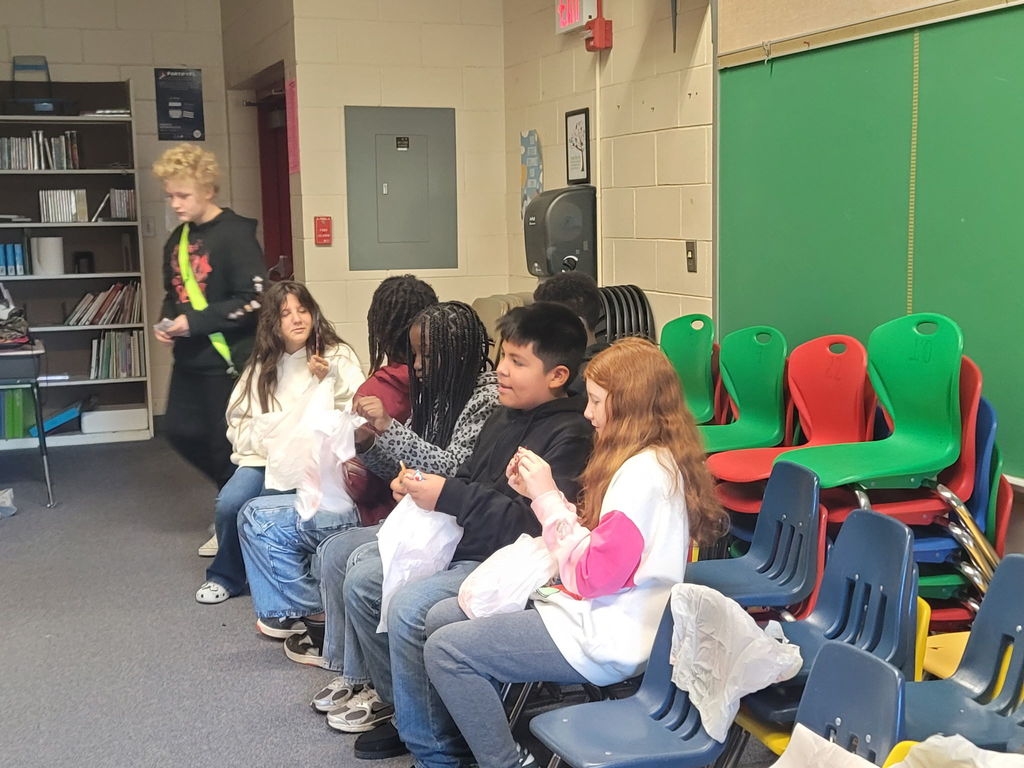 AES Students and volunteers at the Holiday Dolphin Store.