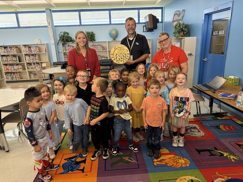 PreK Class presents plate to staff