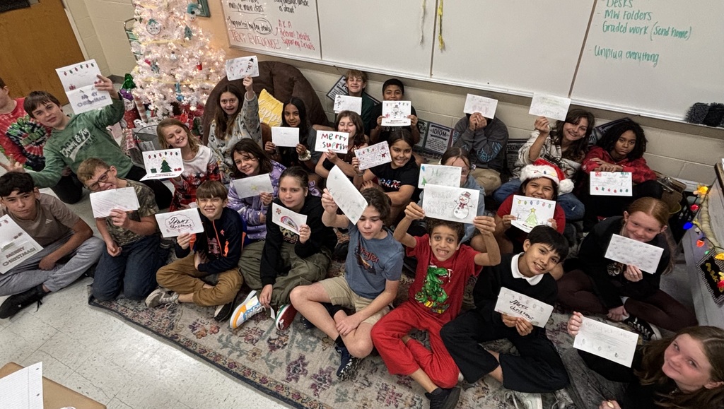 Kids displaying cards