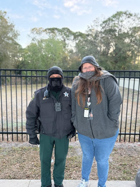 Dueputy Acuna and staff member