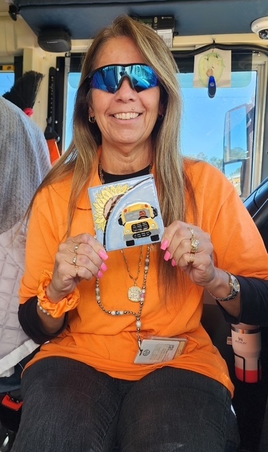 Bus driver Lori with tile.