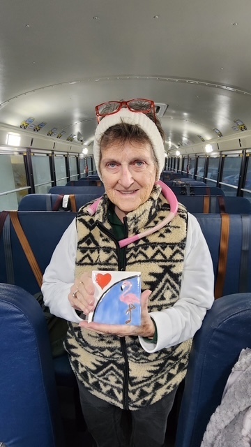 Bus attendant with tile.