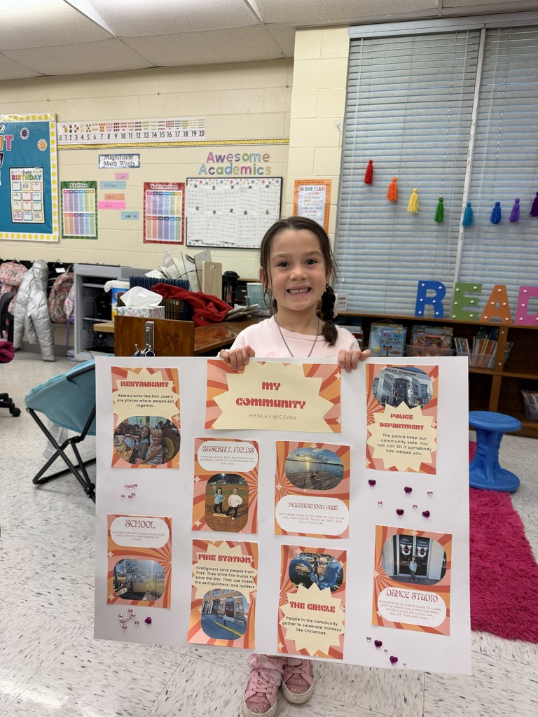 Students displaying their community projects.