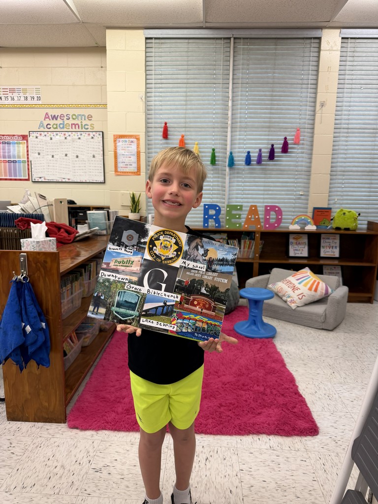 Students displaying their community projects.