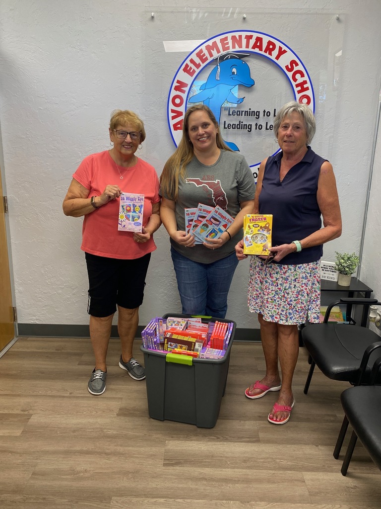 Cornell principal and ladies from Crystal Lake Club who were dropping off a tub of boxed Valentine Cards for our students. 