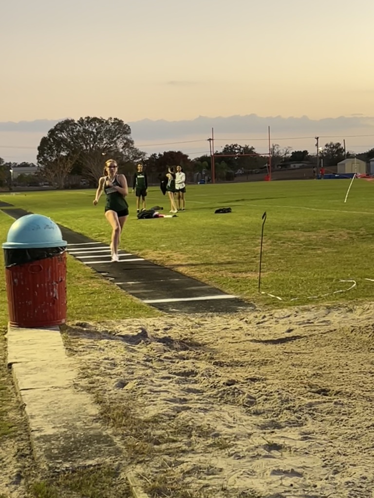 Student in field event.