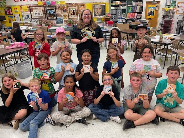 Mrs. Cleveland's class with their completed tiles.