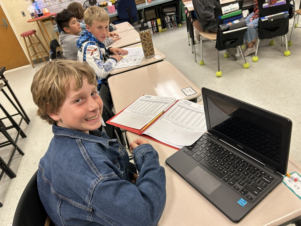 Students from Mrs. Lindley's Class work on their science fair projects.