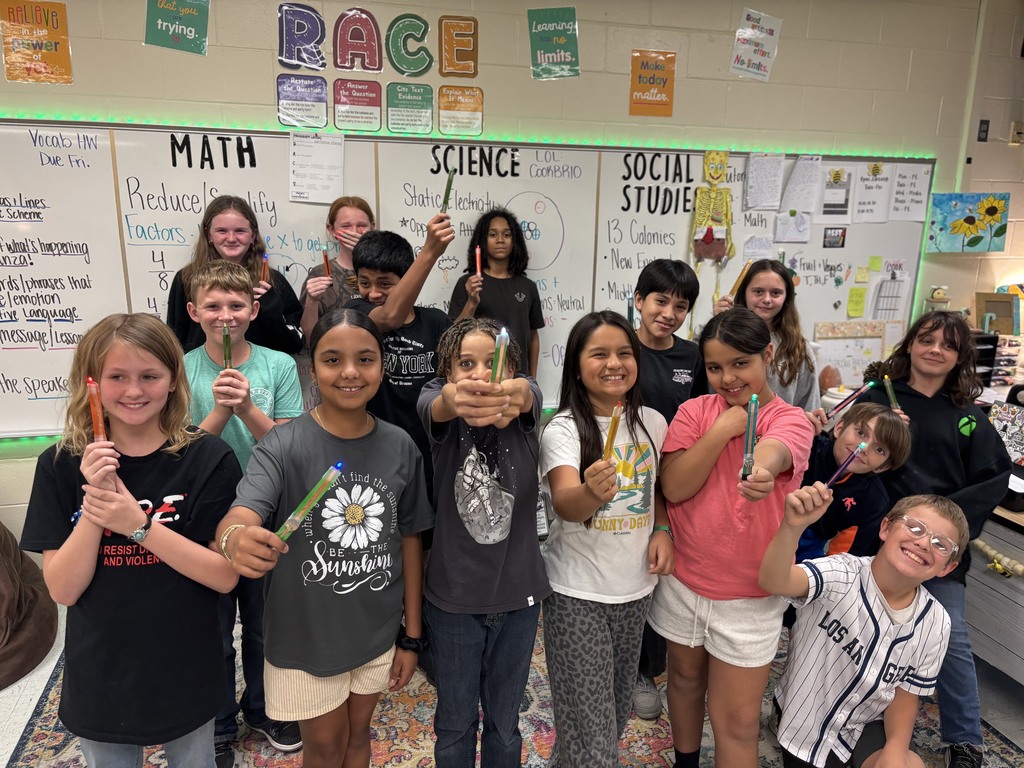 During science block, Mrs. Cook’s 5th graders spent time investigating and illustrating how electricity flows through a closed circuit (a complete loop) by creating their own popsicle stick flashlights!