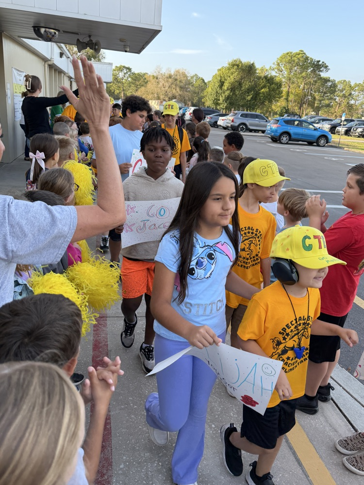 PHOTO OF CTE STUDENTS CHEERING 
