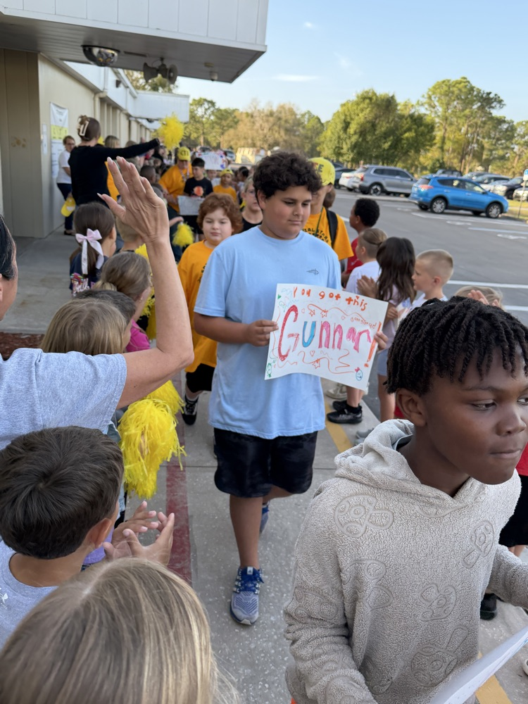 PHOTO OF CTE STUDENTS CHEERING 