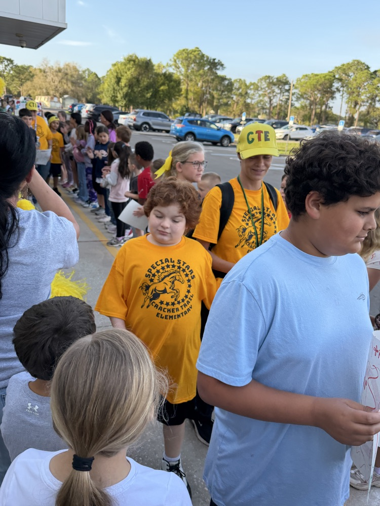 PHOTO OF CTE STUDENTS CHEERING 