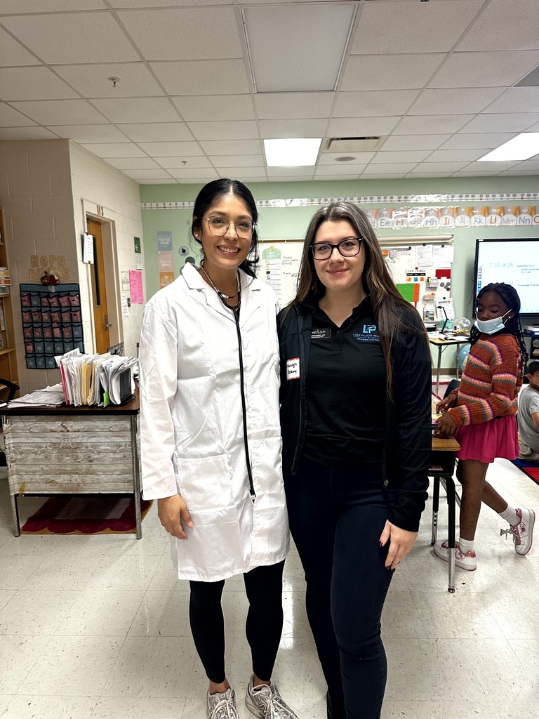 2nd grade students and staff end of unit learning activity on Human Body.