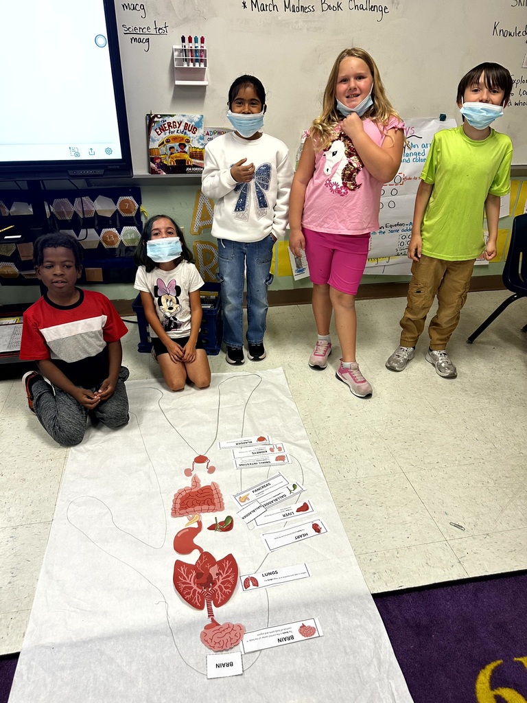 2nd grade students and staff end of unit learning activity on Human Body.