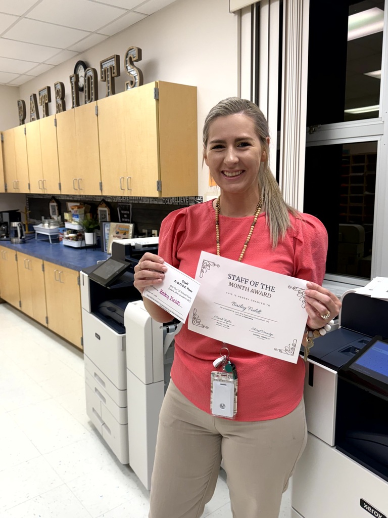 Mrs. Fields pictured holding her certificate.