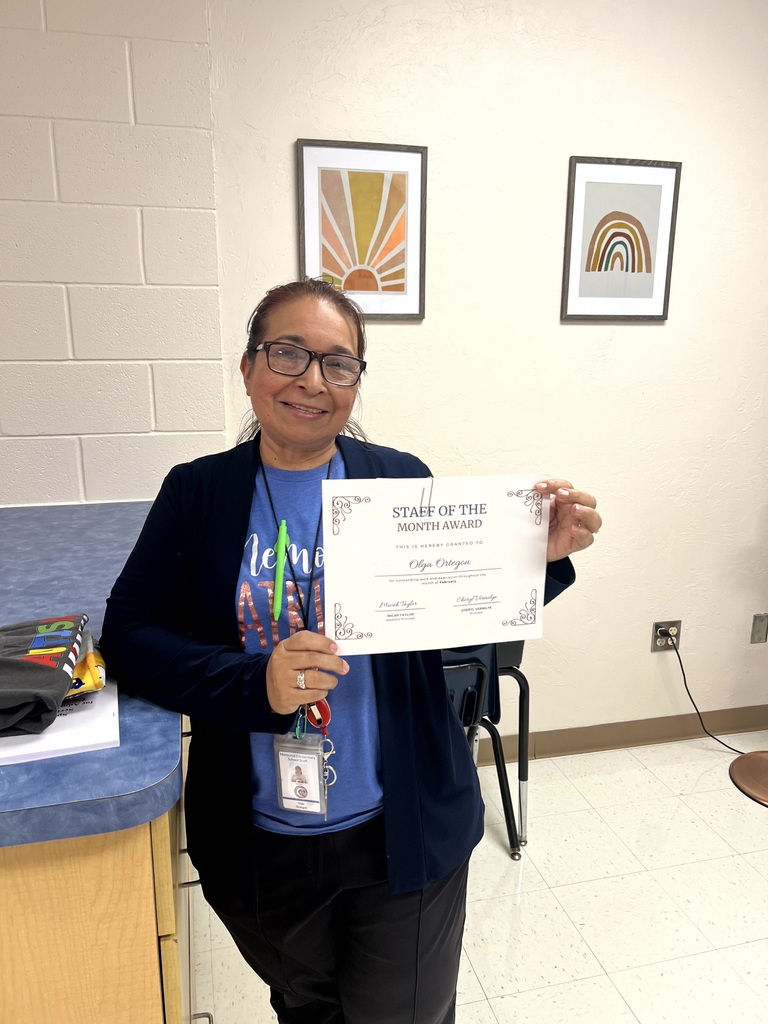 Mrs. Ortegon pictured holding her certificate.