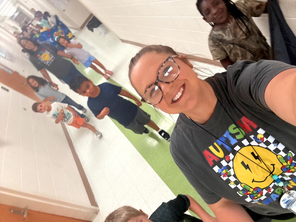 Students and staff during our Austism Awareness hallway walk.