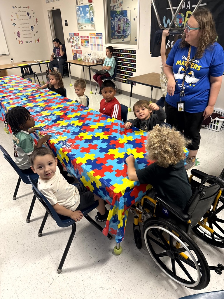 Students and staff during our Austism Awareness hallway walk.