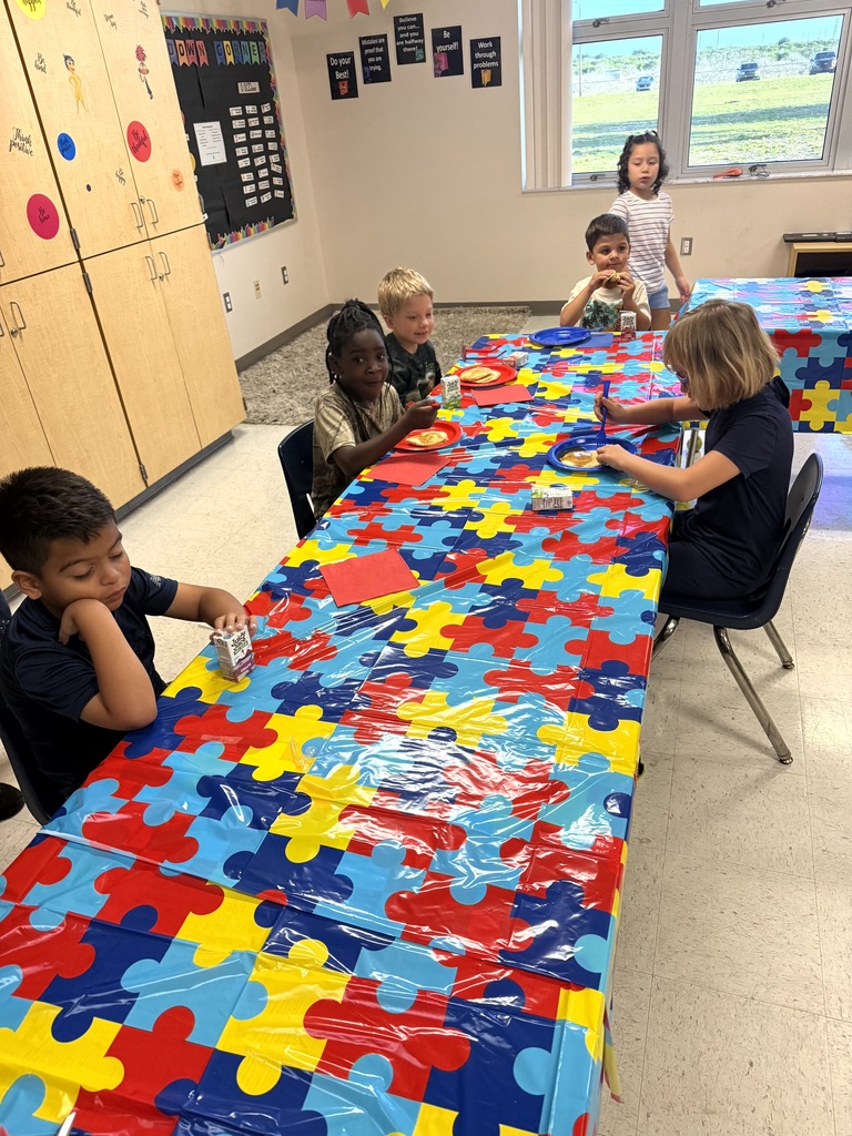 Students and staff during our Austism Awareness hallway walk.