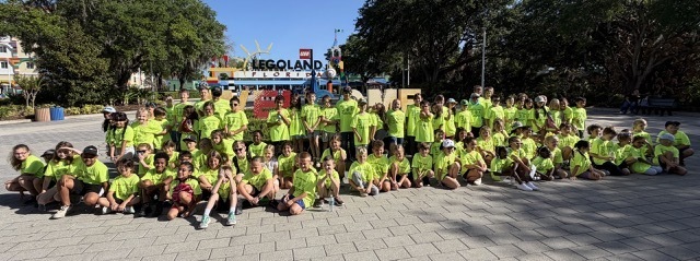 CTE's 2nd graders near the Legoland Entrance Sign