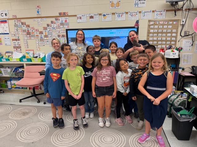 2nd Graders with an "egg-citing" chicken!