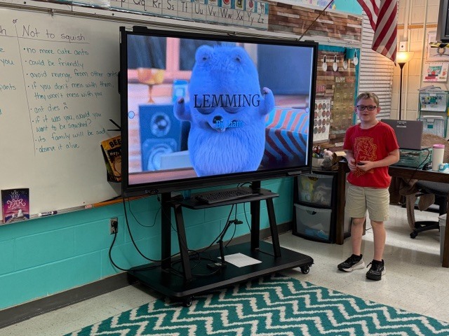 Mrs. Carter's class presents on habitats.