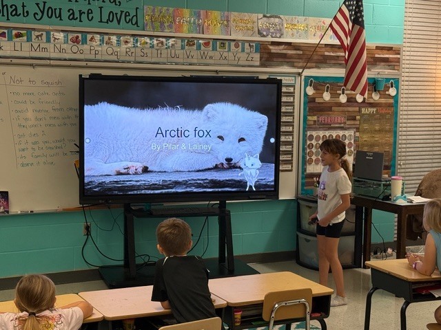 Mrs. Carter's class presents on habitats.