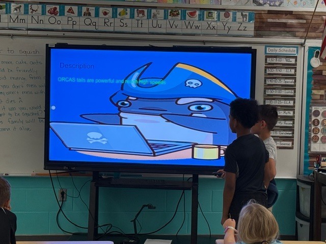 Mrs. Carter's class presents on habitats.