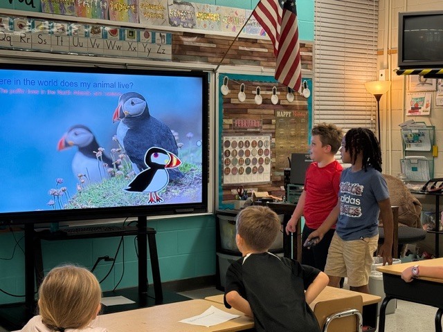 Mrs. Carter's class presents on habitats.