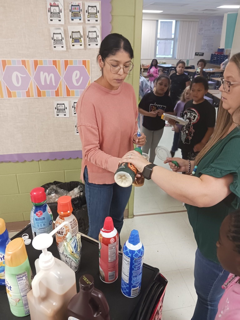 MES Students delivering coffee cart to MES Staff.