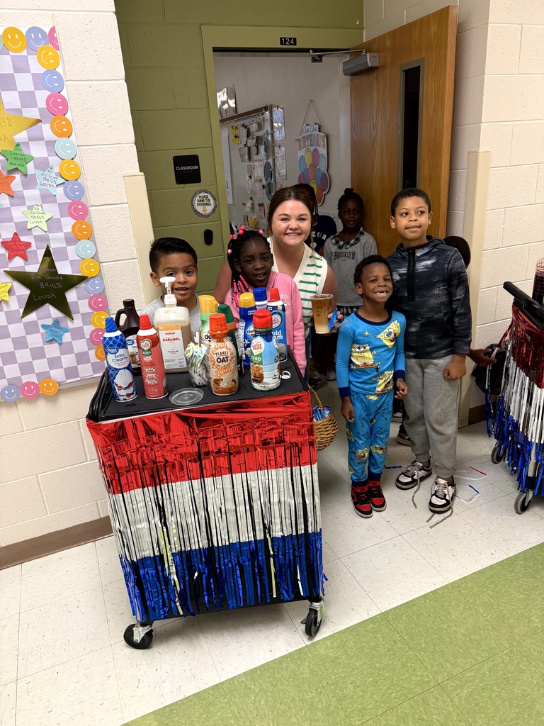 MES Students delivering coffee cart to MES Staff.