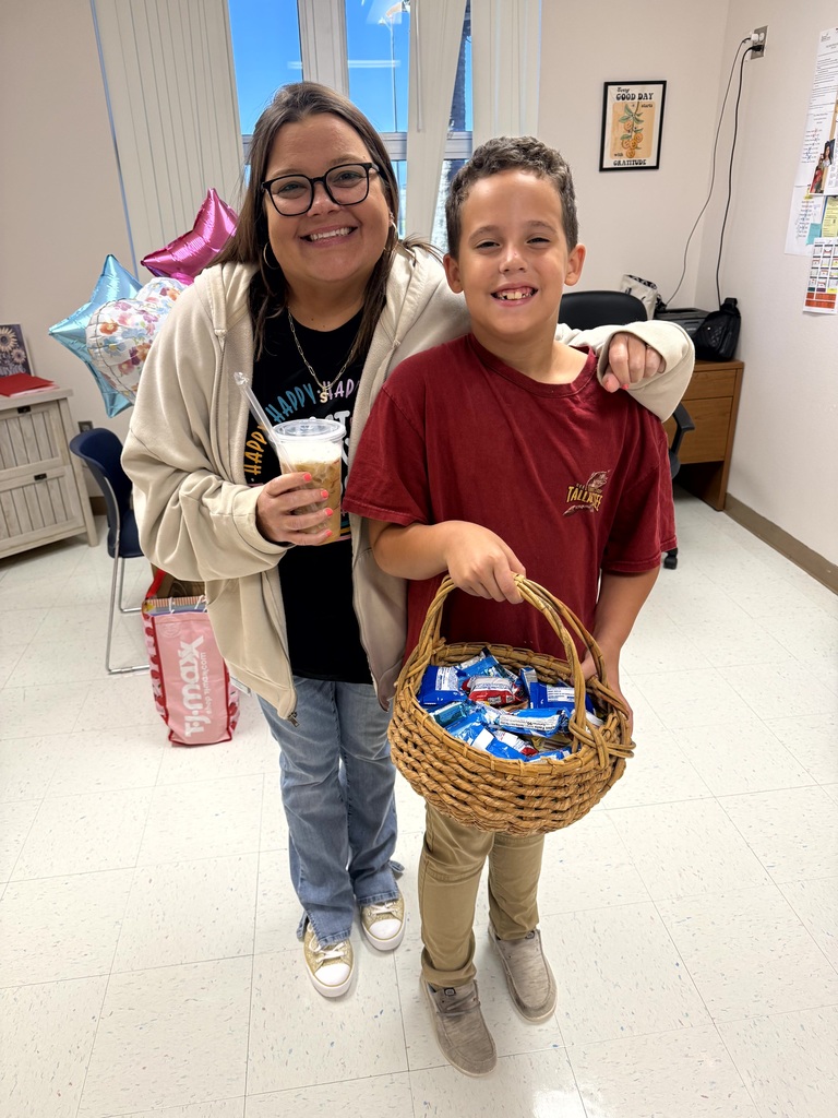 MES Students delivering coffee cart to MES Staff.