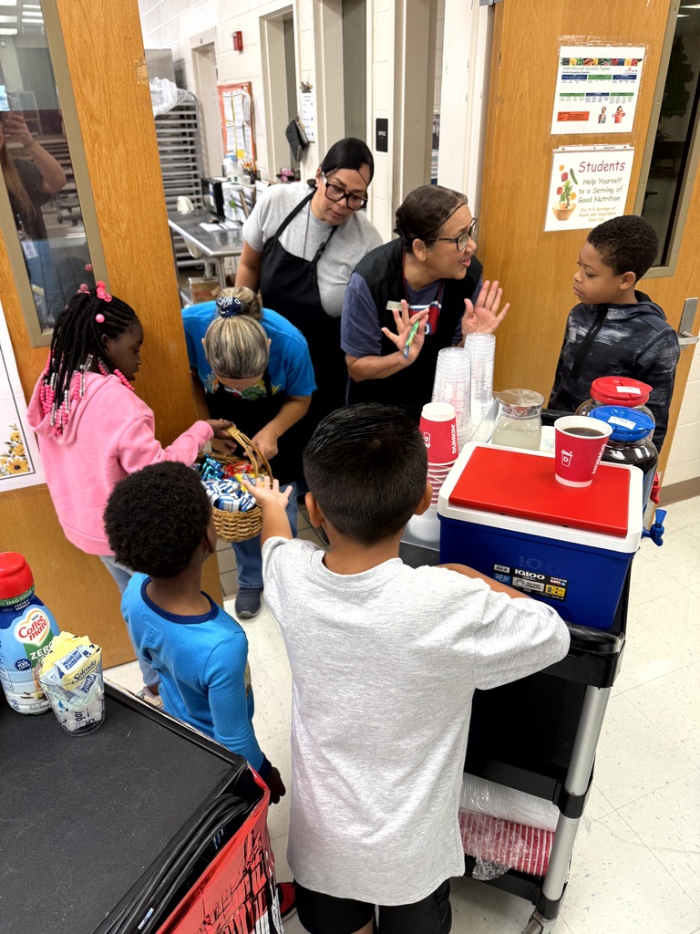 MES Students delivering coffee cart to MES Staff.