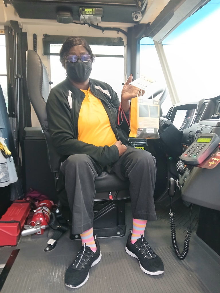 AES Bus driver with goodie bag for Bus Driver Appreciation day 2026.