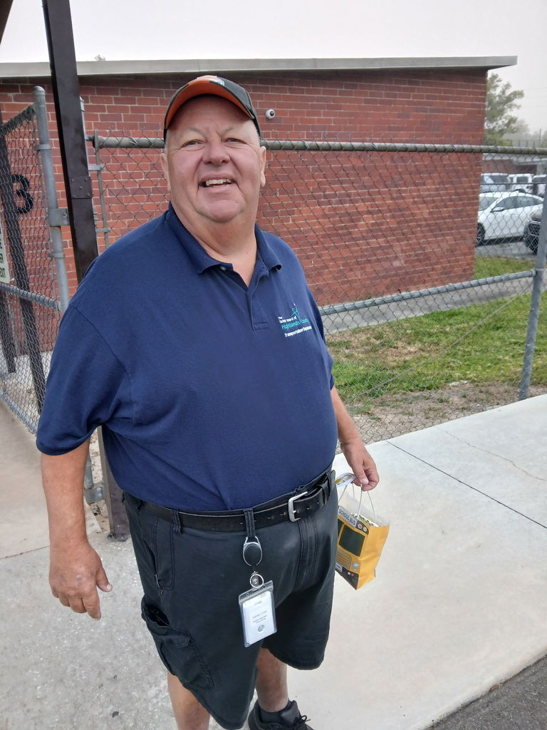 AES Bus driver with goodie bag for Bus Driver Appreciation day 2026.